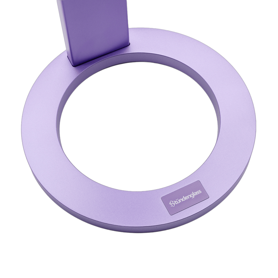 Violet Purple Gravity Infuser V3 in motion mid-rotation with cascading water